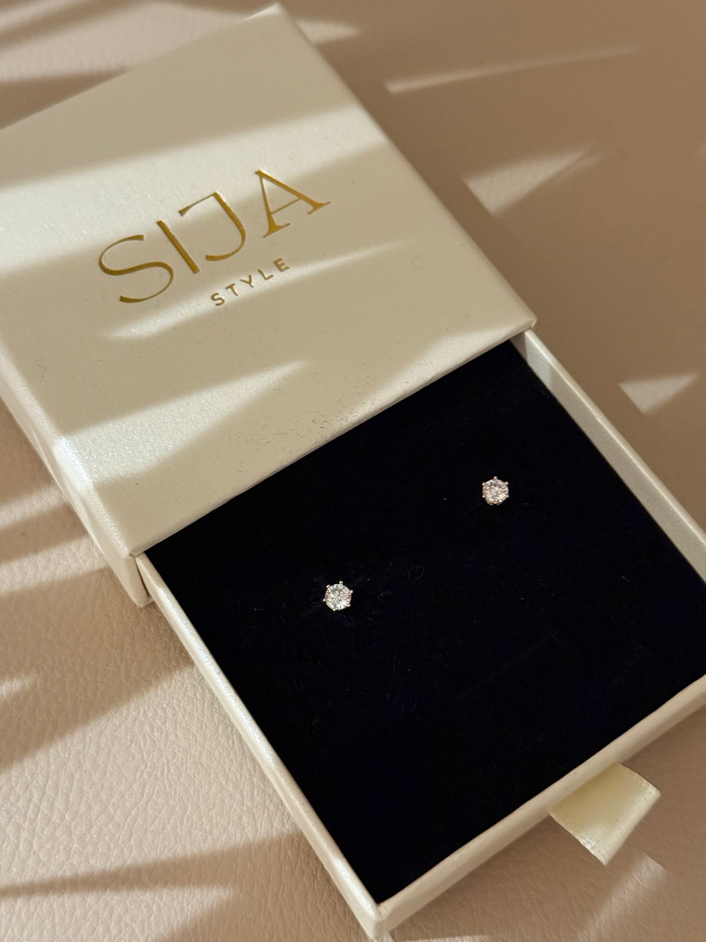 PAAUKSUOTI AUSKARAI "RASOS LAŠAI"